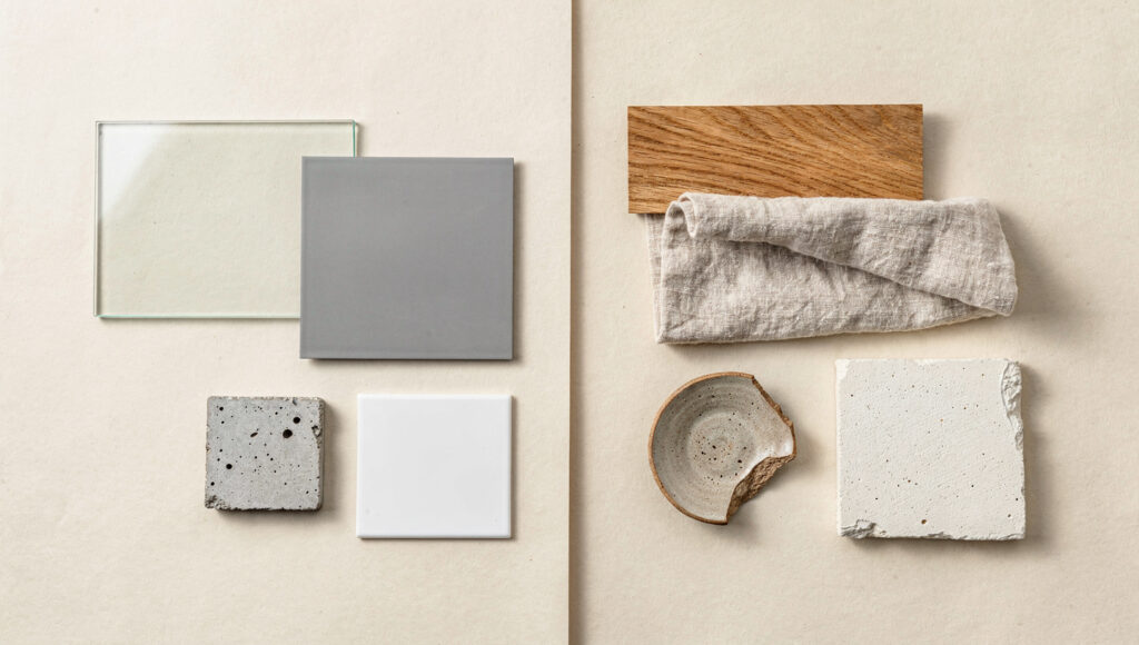 Overhead flat-lay comparing two material sets: glass, steel, and concrete on the left, oiled oak, linen, and clay on the right